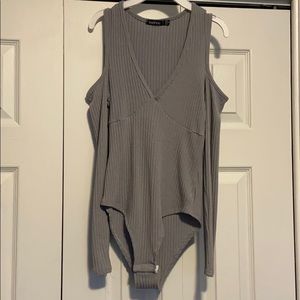 Ribbed taupe colored bodysuit with cut outs!